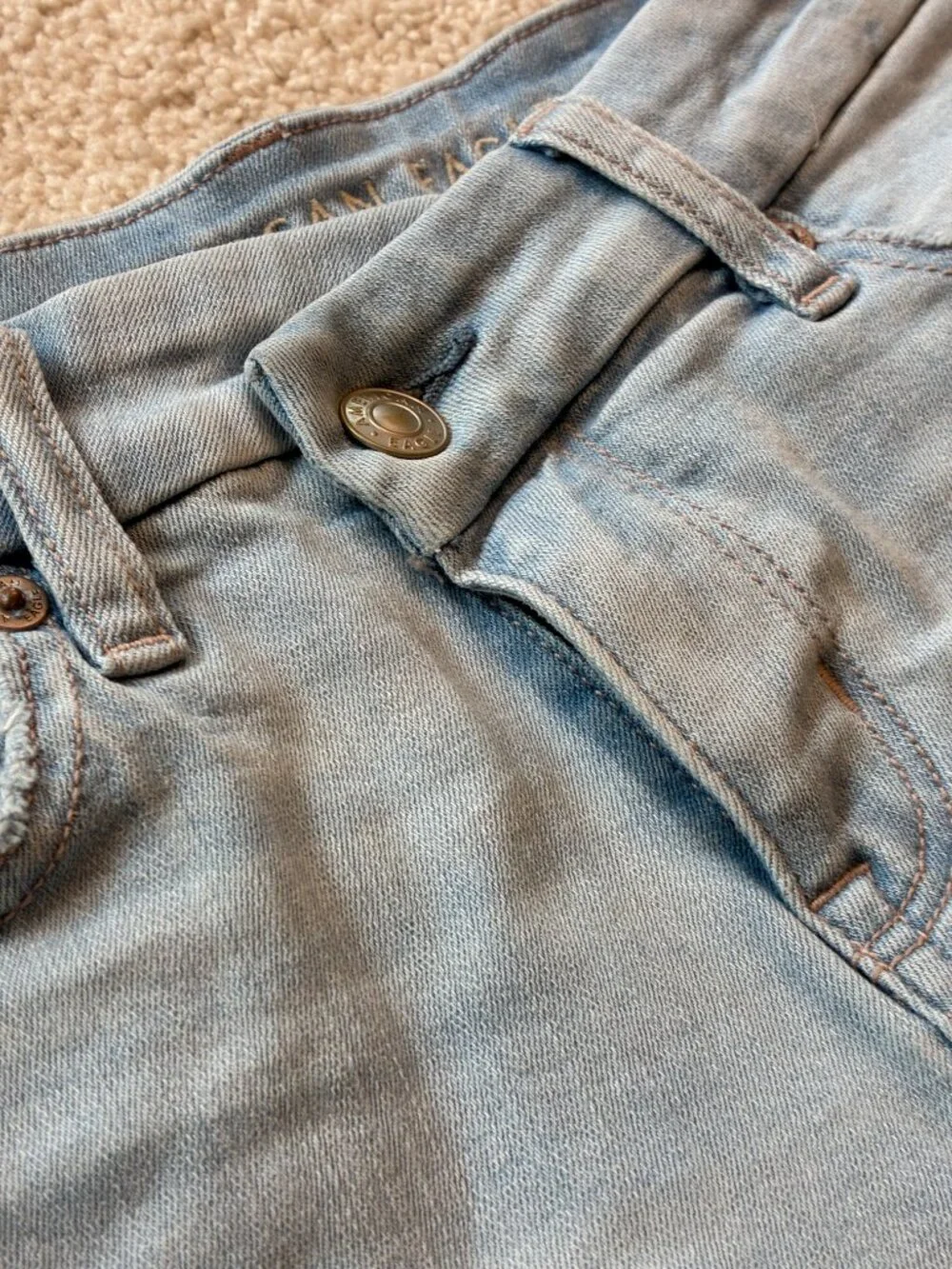 American Eagle Curvy High-Rise Shortie Stretch Jean Cross-Front Button Shorts - Picture 4 of 14